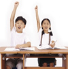 students raising hands